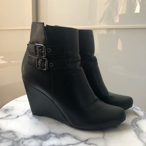 Black buckle ankle boot heels